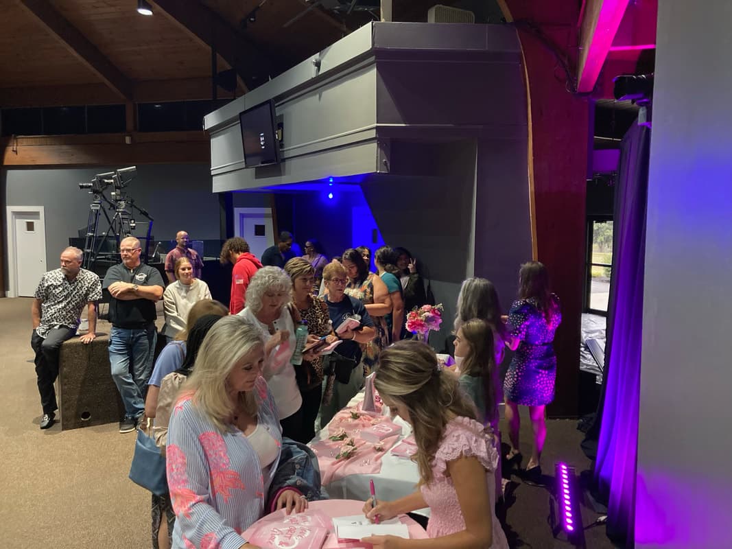 Amanda signing books and meeting readers